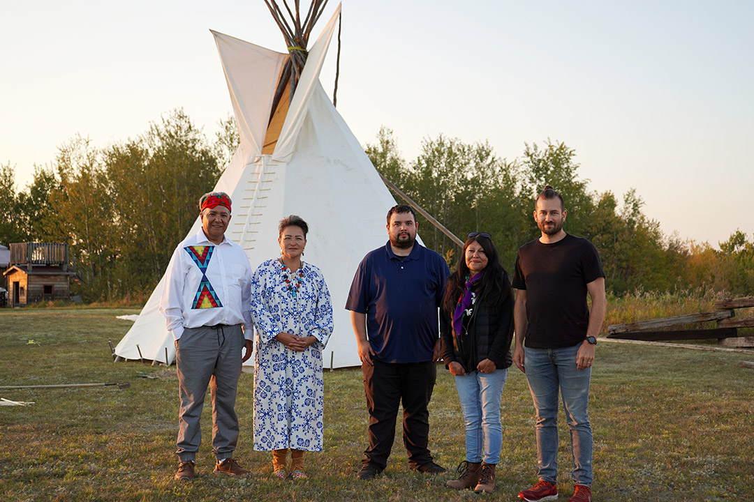Researchers from Onion Lake Cree Nation, Ralph Morin and Dolores Pahtayken (left), stand with researchers from Pewaseskwan (the Indigenous Wellness Research Group), Jarrett Crowe (centre), Anne Mease (second from the right), and Luke Heidebrecht (right)