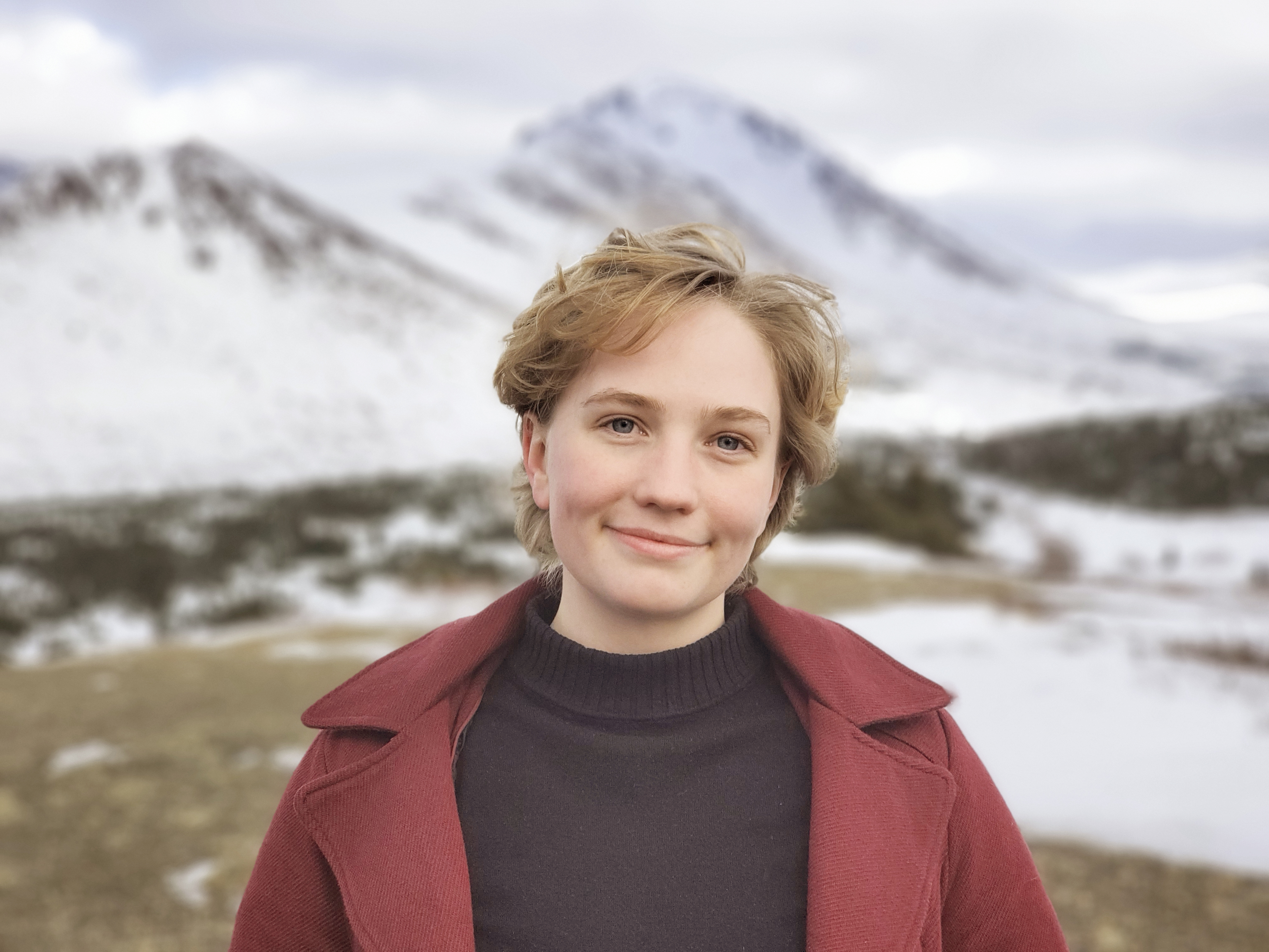 Laura Ditto stands in the Chugach Mountains of Anchorage, Alaska.