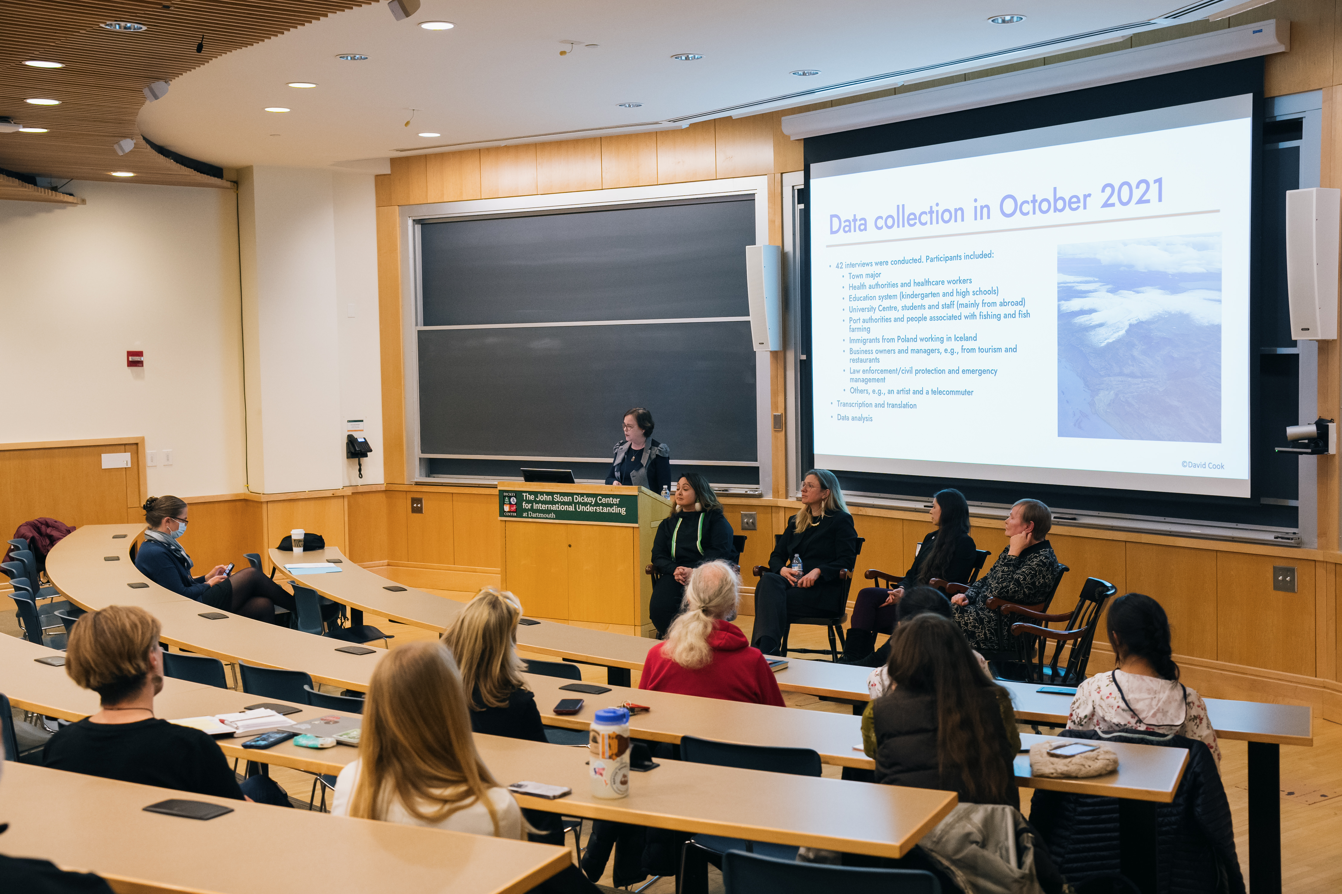 COVID Panel - Dr. Lára Jóhannsdóttir at the podium (Iceland), left to right on the chairs: Dr. Gwen Healey, Dr. CHristina VL Larsen (Denmark/Greenland); Dr. Katie Cueva (Alaska); Dr. Arja Rautio (Finland)